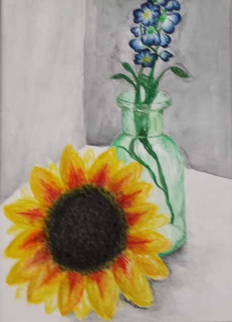 Sunflower and flower in a vase