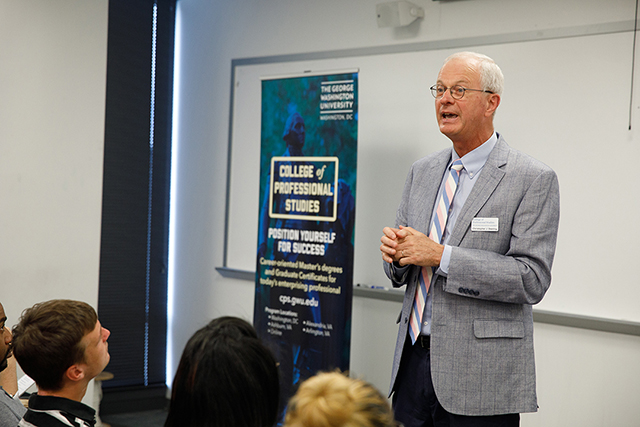 Dean Deering welcomes accepted students to CPS in Arlington, VA (GW/William Atkin)