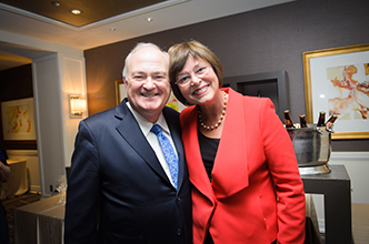 GW School of Nursing Dean Jean Johnson poses with  GW president Steven Knapp at her farewell reception.