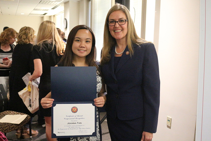 Rep. Wexton with Best of Show winner Joanna Rivera Tan
